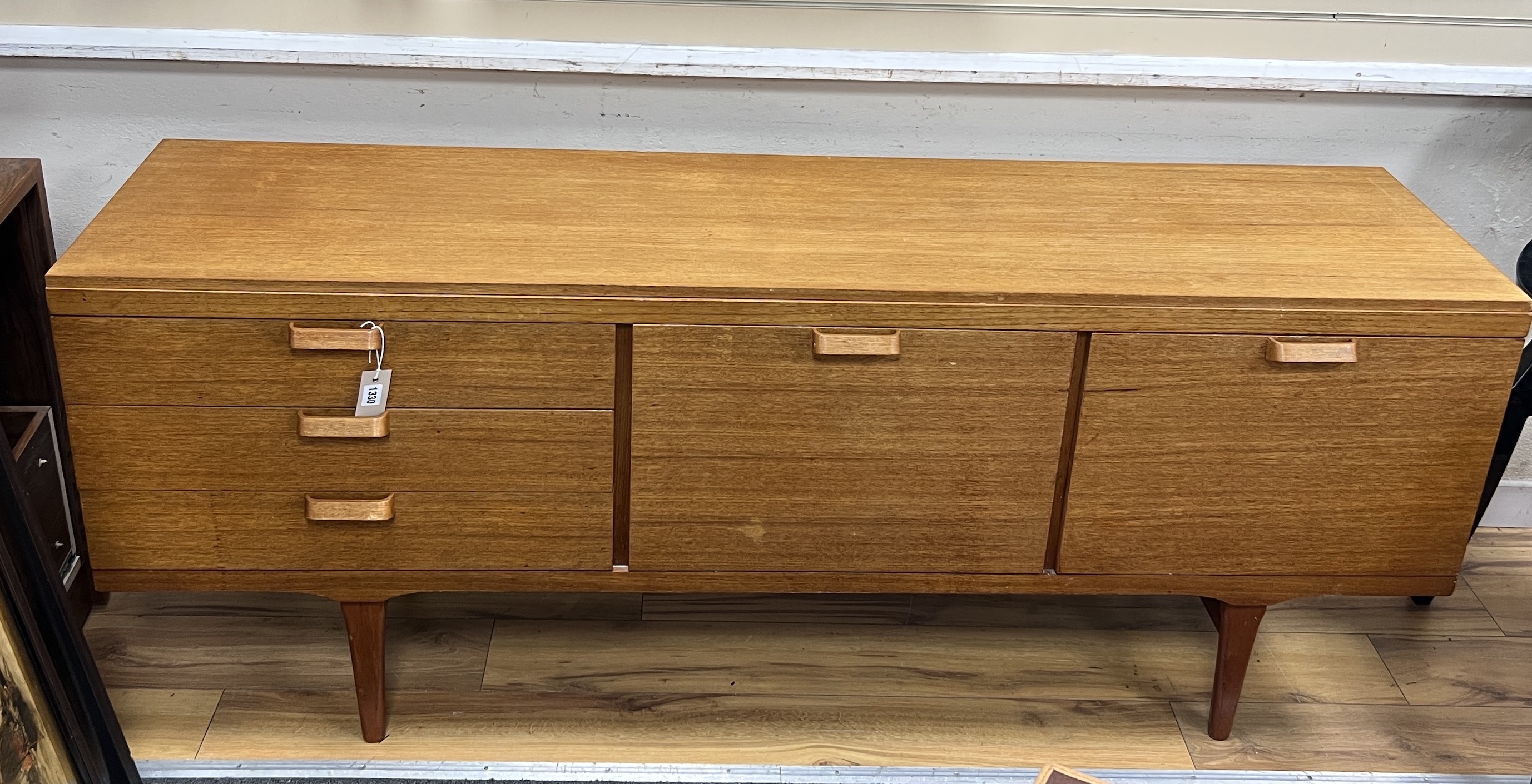 A mid century Scandinavian 'Gyros' teak sideboard, length 180cm, depth 44cm, height 73cm